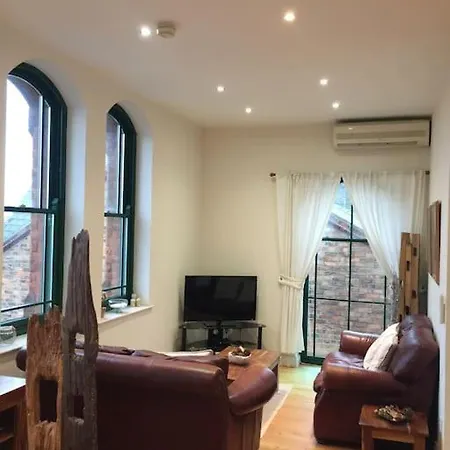 Converted Chapel Floor To Ceiling Arch Window