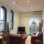 Converted Chapel Floor To Ceiling Arch Window