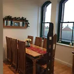 Converted Chapel Floor To Ceiling Arch Window Apartament *
