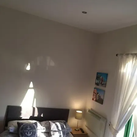 Apartament Converted Chapel Floor To Ceiling Arch Window